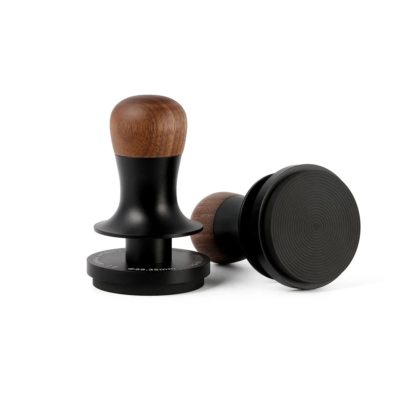 Two coffee tampers with wooden and black finishes on a white background