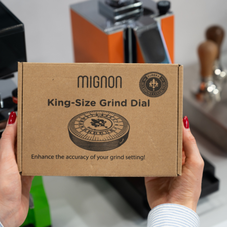 Eureka King-Size aluminum grind dial held in hand showing clear numbered markings and logo.