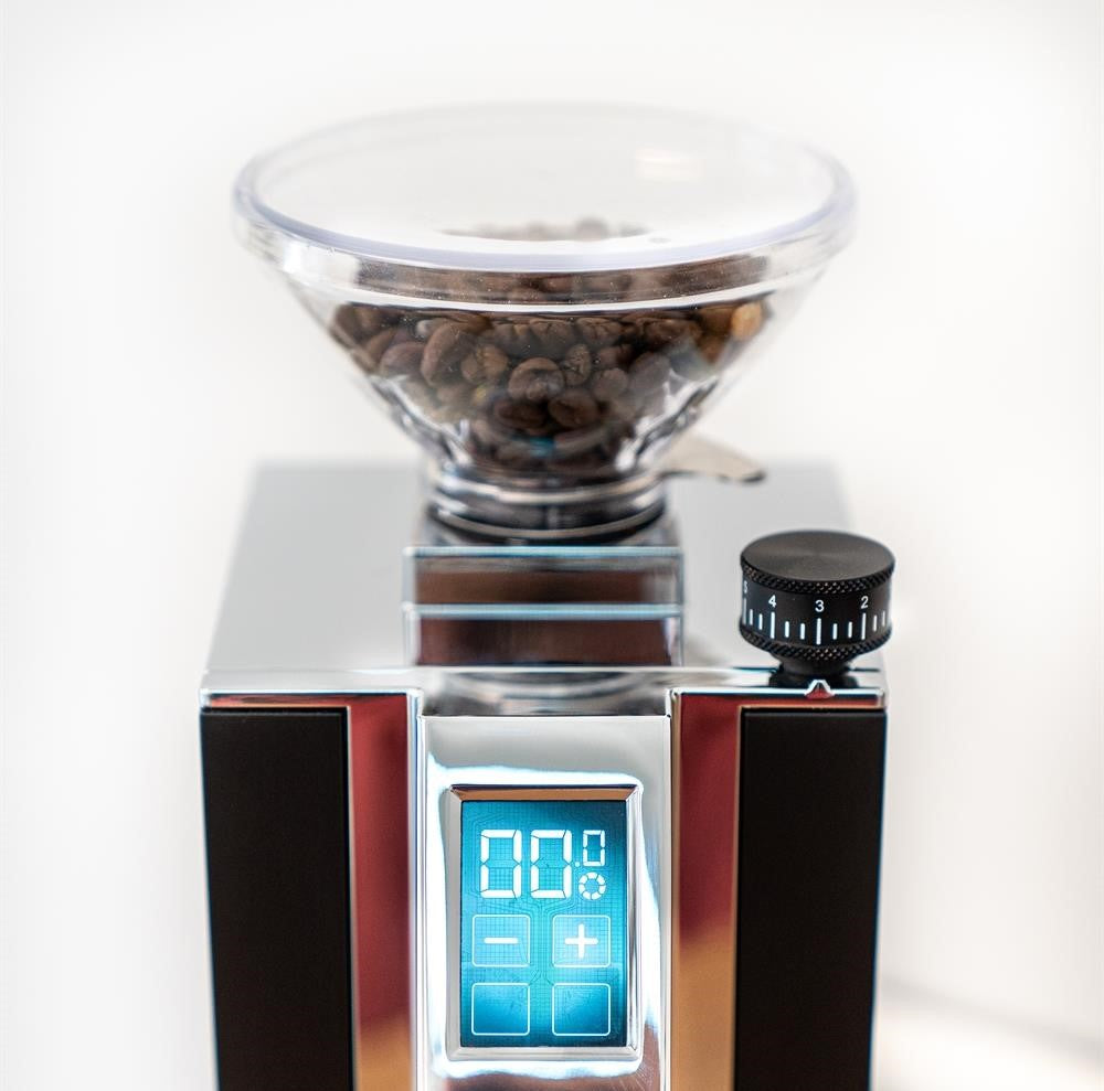Eureka Mignon Single Dose Hopper components showing anti-popcorn gate and tray included
