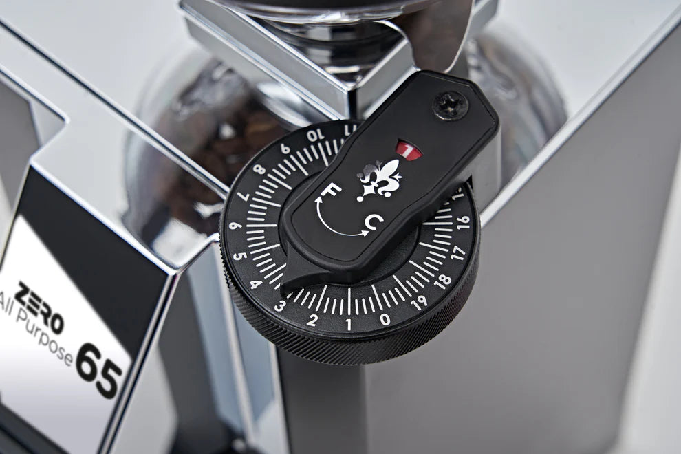 Eureka Mignon Zero 65 dosing cup and bellows system for zero retention grinding.