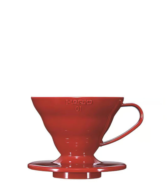 Hario V60 plastic coffee dripper in red with cone shape and side handle for pour-over brewing