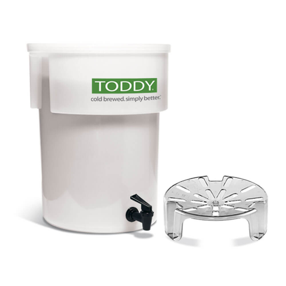 Toddy Cold Brew Commercial Model with Lift featuring white brewing container with green logo, black spigot, and perforated lift platform.