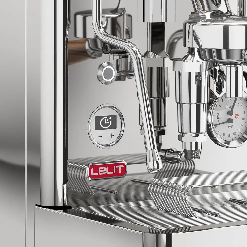 Close-up of a Lelit espresso machine with control panel and gauge.