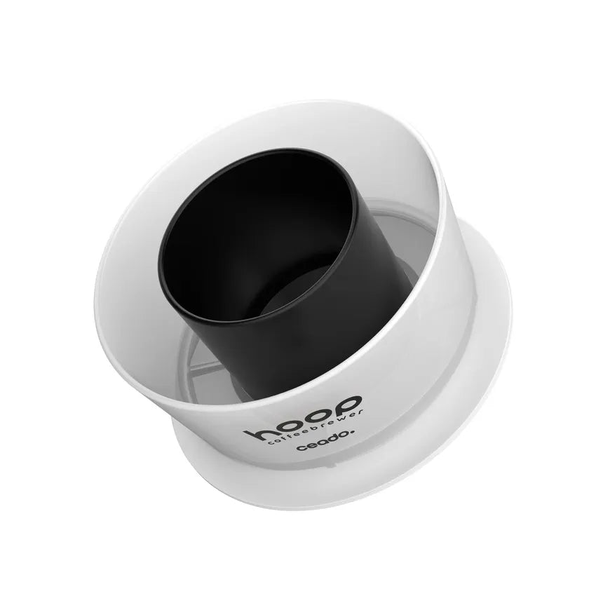 Ceado Hoop Coffee Brewer featuring white outer ring housing with black inner brewing chamber and central spout, displayed in product listing interface showing innovative no-bypass radial infusion brewing technology