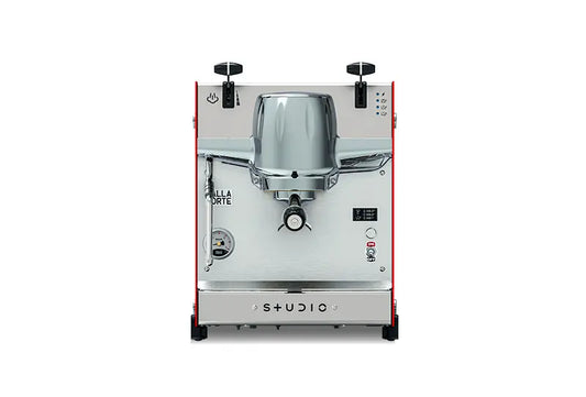 "Dalla Corte Studio professional espresso machine product page displaying stainless steel commercial-grade machine with advanced multi-boiler technology, digital touchscreen interface, and product description highlighting flow rate display, intelligent controls, and precision brewing capabilities for home baristas"

