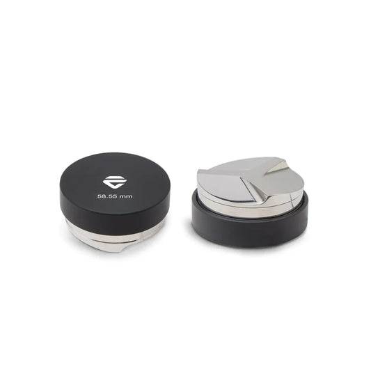 Lelit Coffee Leveller 58.55 mm top view with polished stainless steel base and black handle
