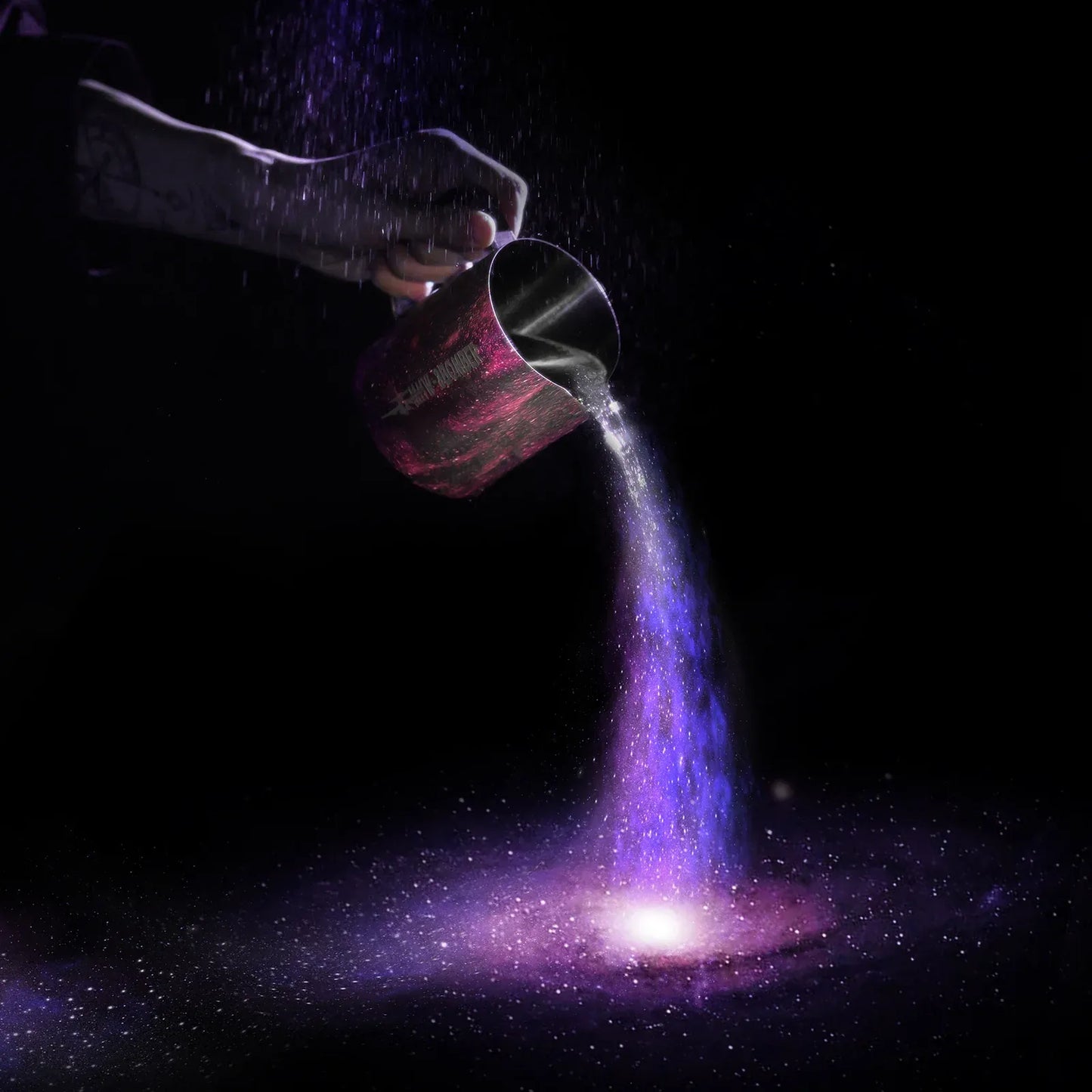 Purple powder being poured from a container onto a dark surface, creating a glowing effect.