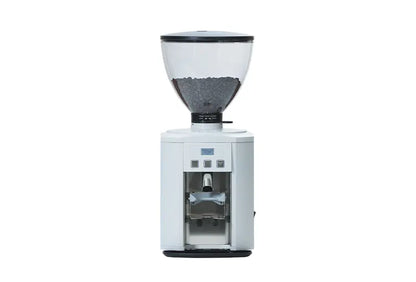Side angle view of Dalla Corte DC One grinder with visible bean hopper and grinding mechanism