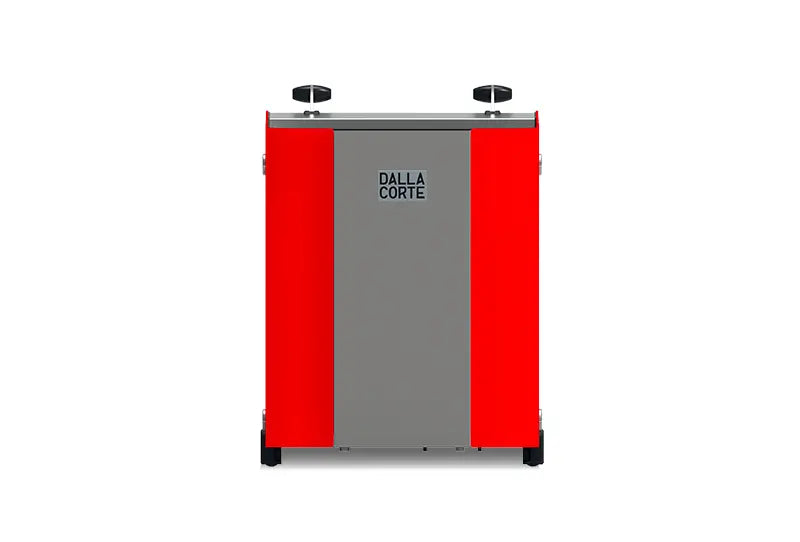Red back view of Dalla Corte Studio espresso machine highlighting water connections and vents