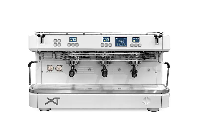 Side angle showing wooden panel Dalla Corte XT Barista with three-group heads and ergonomic design