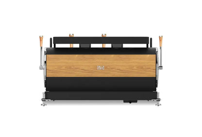 Side profile of Dalla Corte Zero Barista showing elegant wood-accent base and ergonomic design
