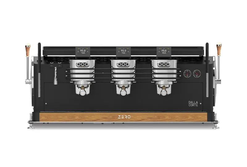 Dalla Corte ZERO Classic group head detail with precision portafilters and brewing chambers
