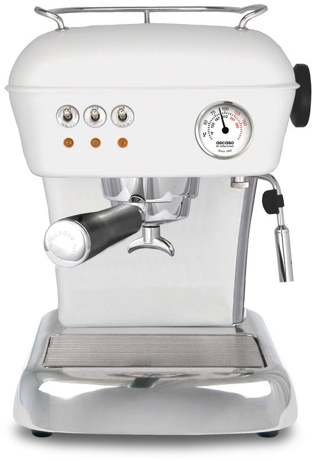 Dream espresso machine front view, white finish, chrome details, pressure gauge, steam wand.
