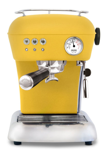 Dream espresso machine front view, yellow finish, chrome details, pressure gauge, steam wand.

