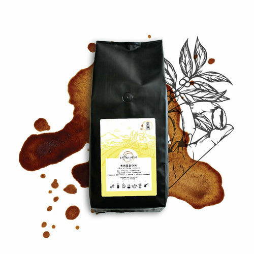 Erebor coffee bag with artistic yellow label featuring botanical illustrations and exotic origin branding
