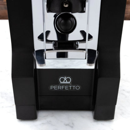 Eureka Mignon Perfetto grinder angle view showing Easy Setting dial and portafilter fork.

