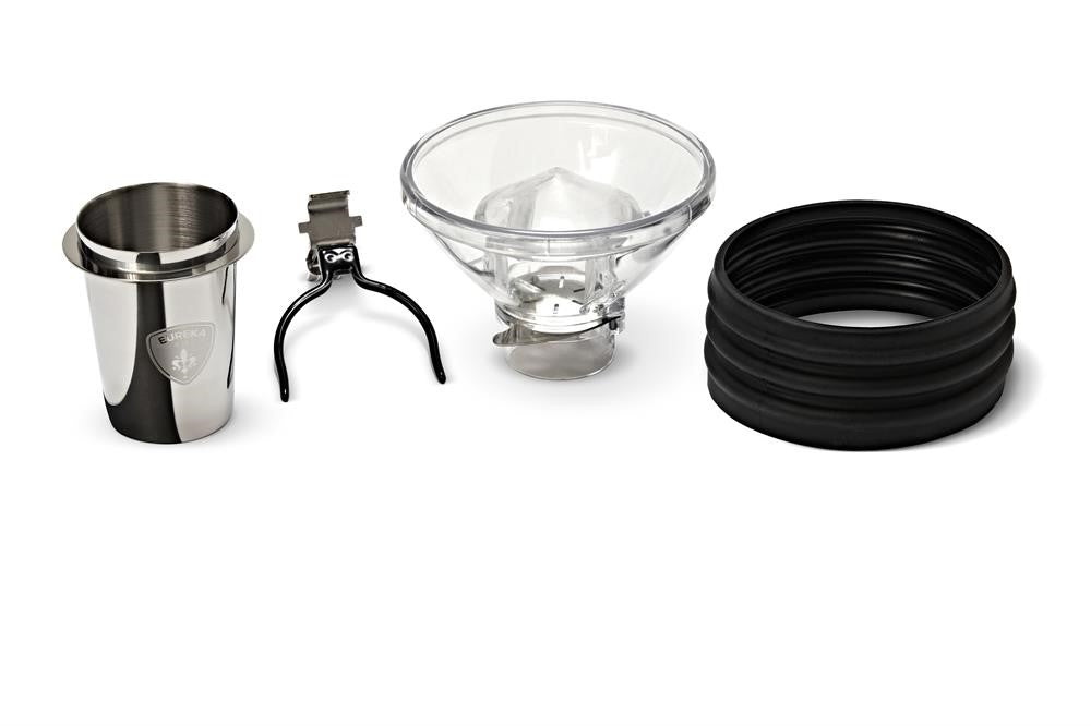Eureka Mignon Single Dose Kit components including stainless steel dosing cup, clear hopper, portafilter holder and anti-vibration rings
