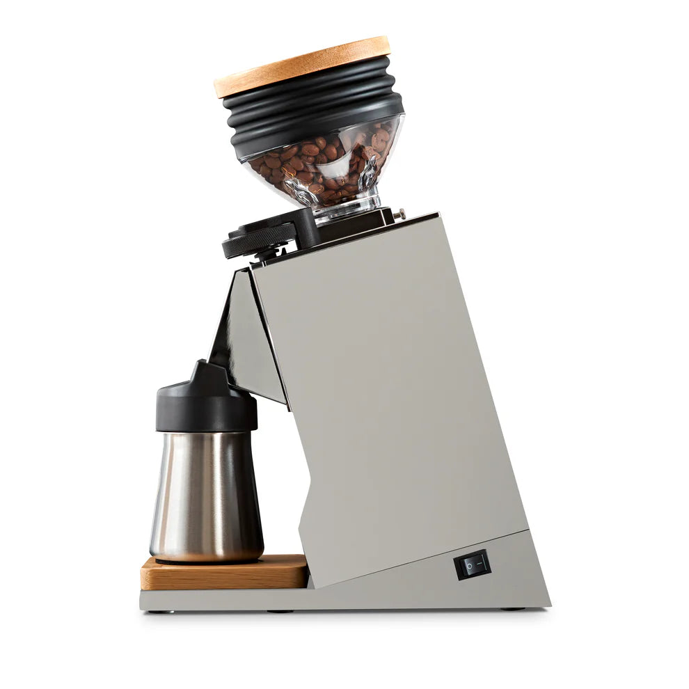 Profile view of Eureka Mignon Single Dose PRO grinder, showing hopper, lid, and dosing cup.
