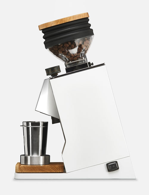 Eureka Mignon Single Dose PRO coffee grinder, white finish, wooden lid, steel dosing cup.
