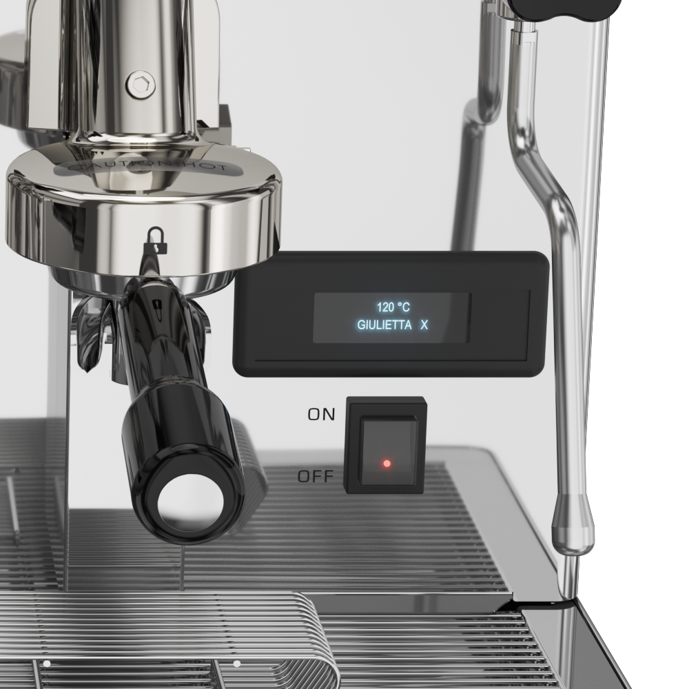 Lelit GiuliettaX group head detail with precision portafilters and brewing chambers

