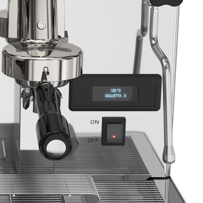 Lelit GiuliettaX group head detail with precision portafilters and brewing chambers
