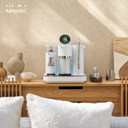 Meraki Espresso Machine white edition on table in cozy bedroom setting.