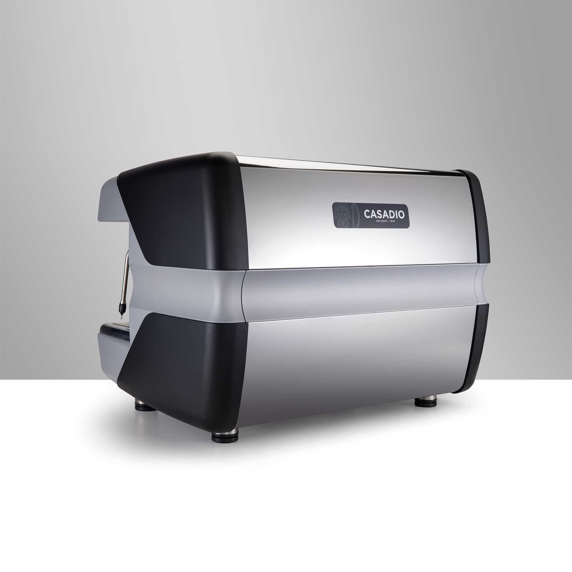 Top view of Nettuno A/2 featuring digital touchscreen interface and professional steam wands
