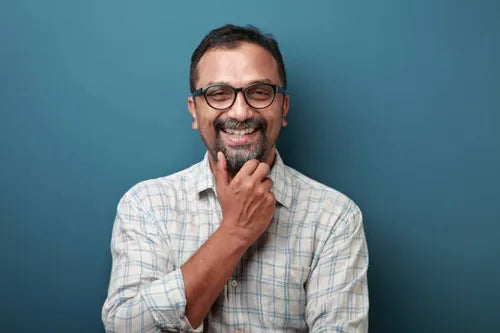 files/portrait-of-a-smiling-middle-aged-man-of-indian-origin.webp