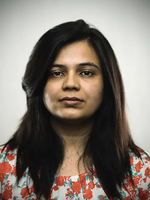 files/portrait-of-a-young-indian-woman-looking-at-camera.webp