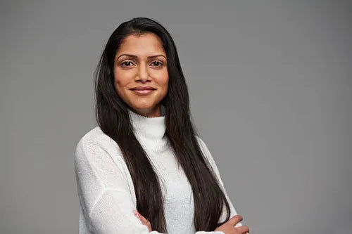 files/portrait-of-cool-woman-with-crossed-arms.webp