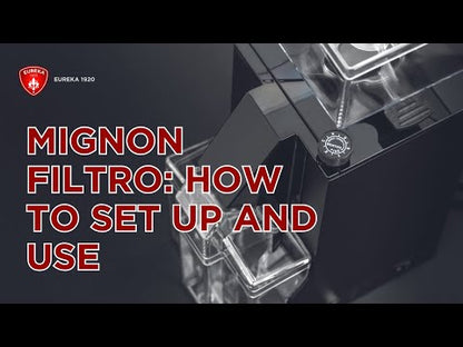 Eureka Mignon Filtro grinder demonstration showing grinding process and catch bin system.