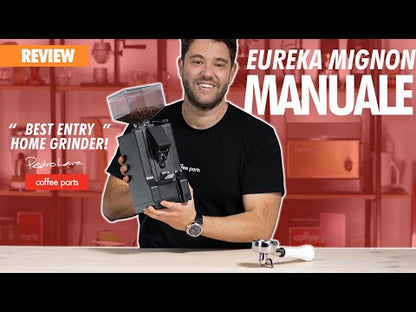 Eureka Mignon Manuale 15BL grinder operation demonstration and manual dosing process.