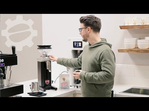 Video demonstration of Eureka Drogheria MCD4 Shop Grinder 75mm grinding coffee into retail bag
